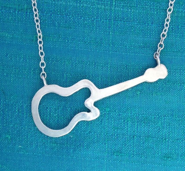 Guitar necklace by Brendan White