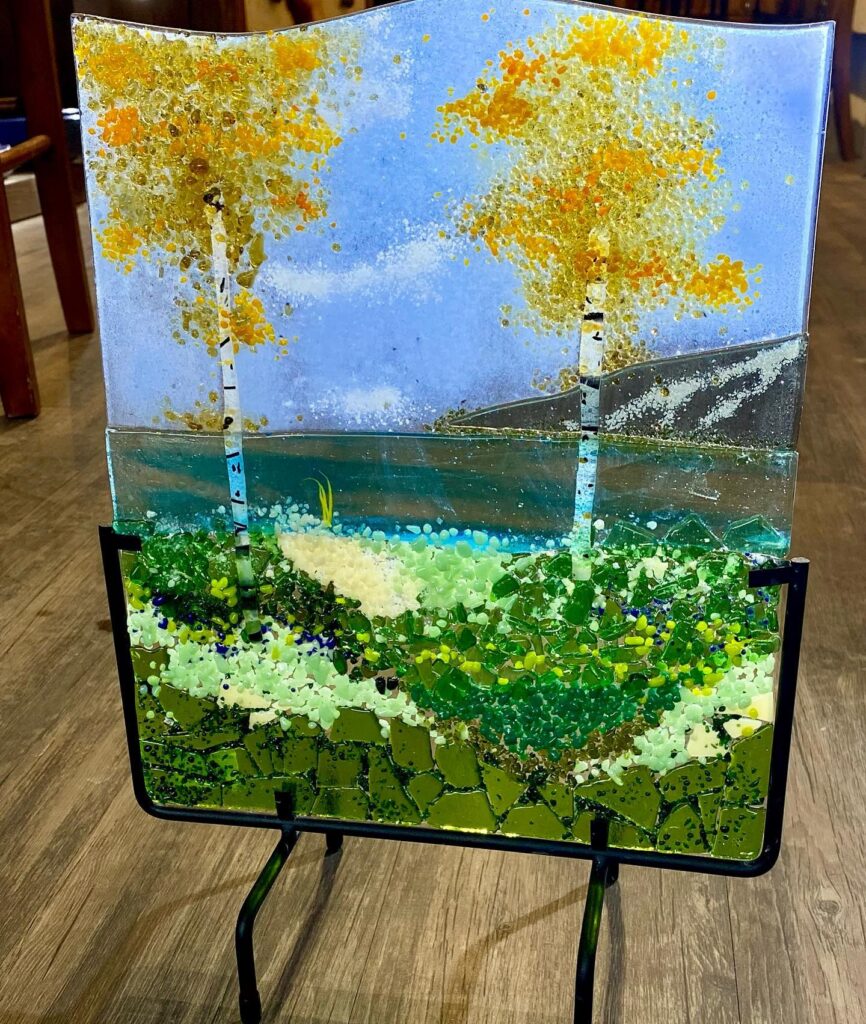 Fused Glass Colorado Scene with aspens and water and mountains by Michelle Manquen. 