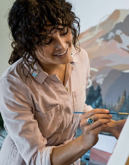 Local Colorado painter, Hannah Jensen, using acrylic brushwork in her studio. 