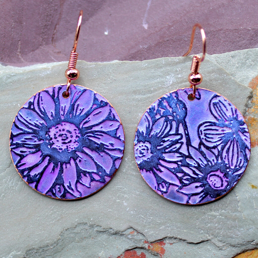 Copper-etched earrings in purple by Gale Schadewald